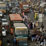 Chaotic traffic scene with pedestrians and cyclists on Indian roads