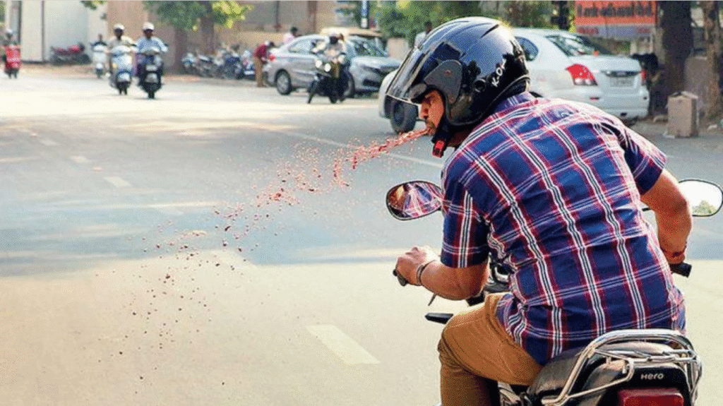 driver spitting gutka while driving