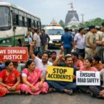 Locals protesting on Nabakalebara Road in Puri after a woman was seriously injured in a bus accident